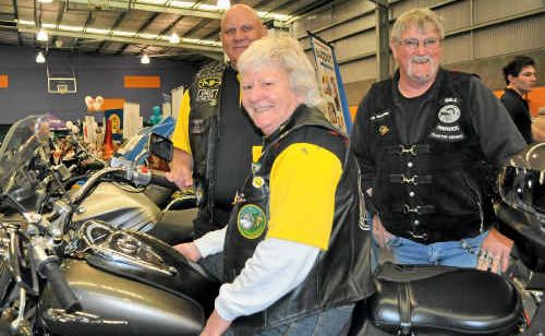 Ulysses club members Genevieve King (front), Dennis King (left) and Bill Doran at the Seniors’ Expo yesterday. Ulysses club members Genevieve King (front), Dennis King (left) and Bill Doran at the Seniors’ Expo yesterday.